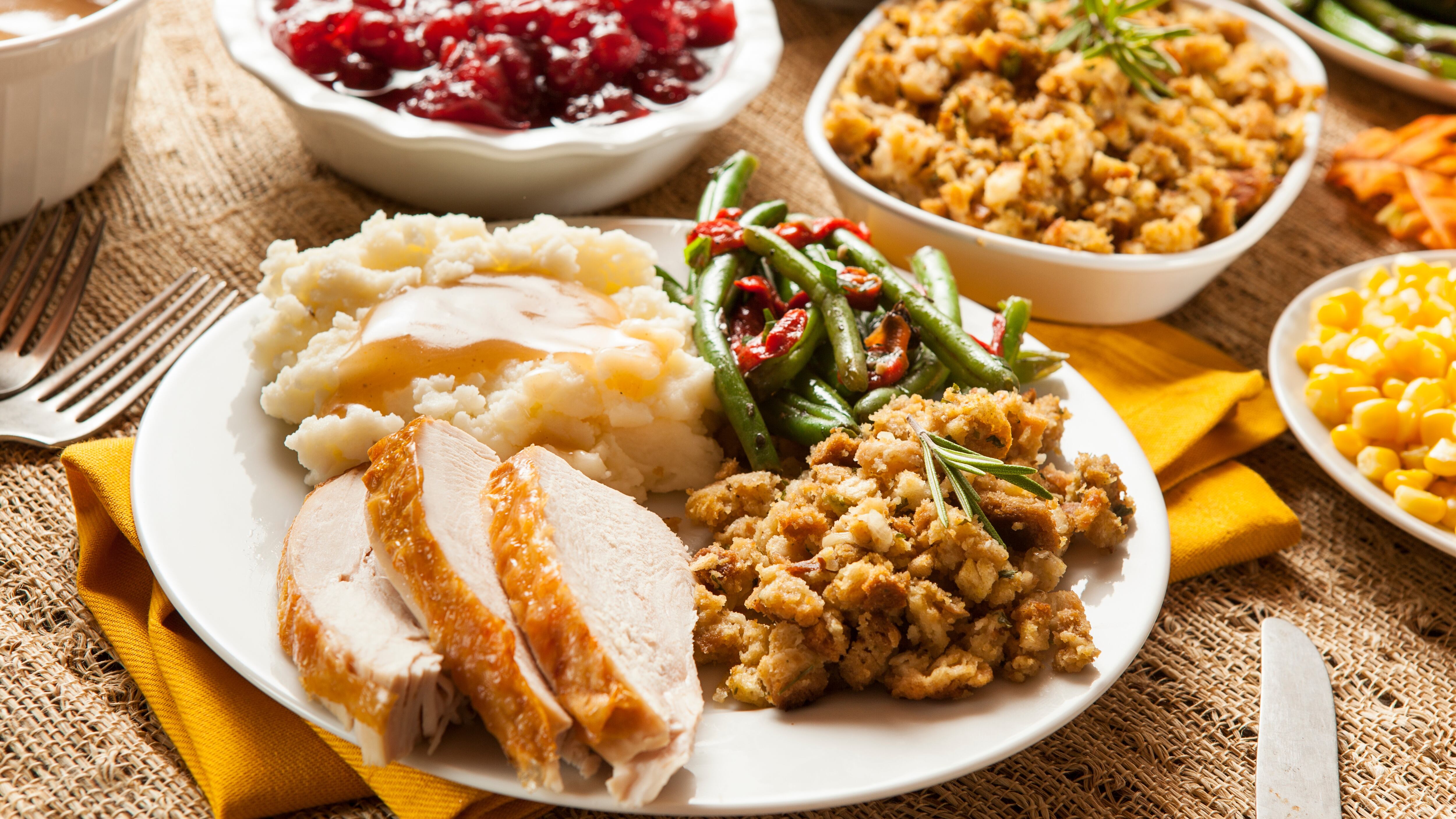 Homemade Turkey Thanksgiving Dinner with Mashed Potatoes, Stuffing, and Corn